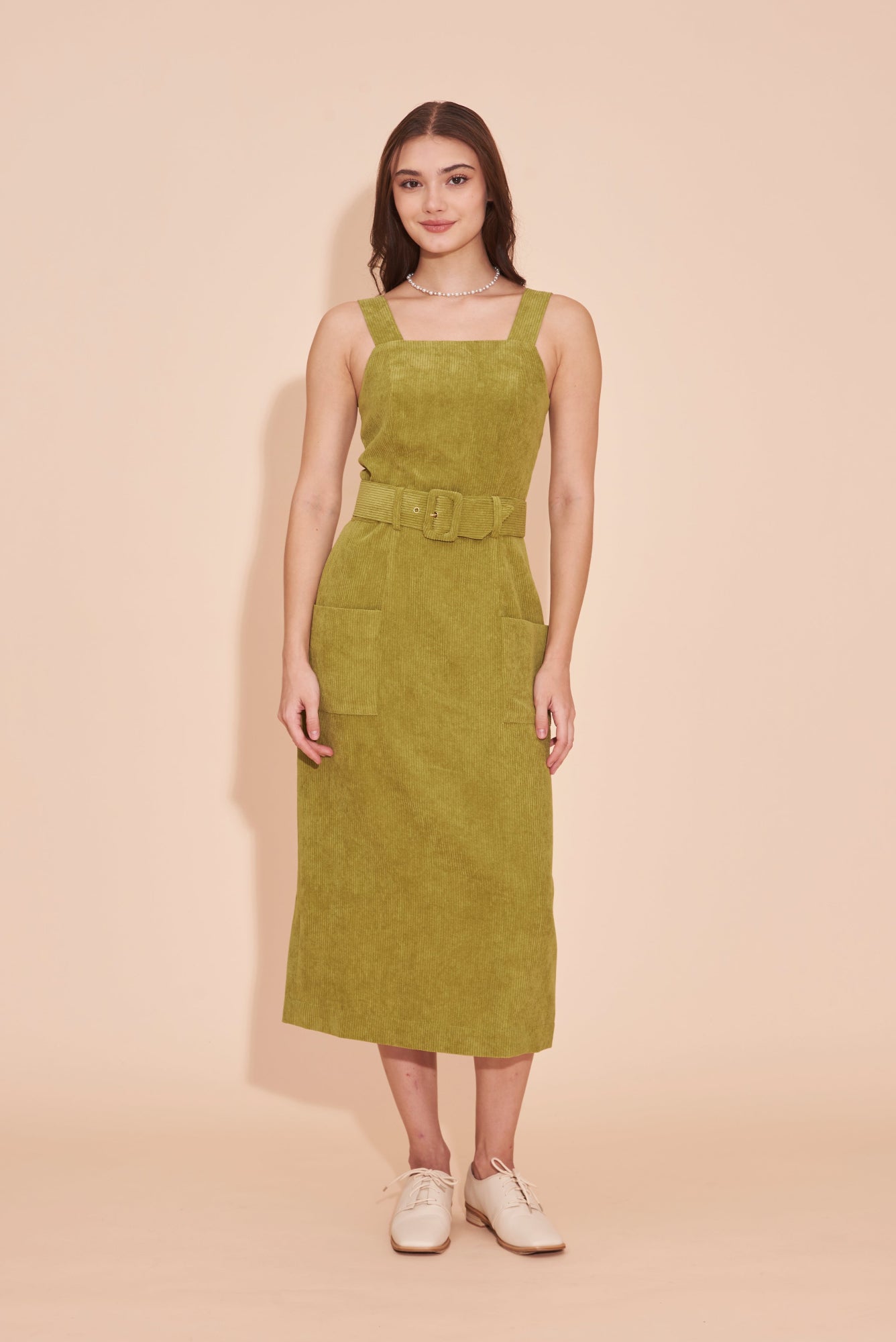 SUNSHINE" Corduroy Pinafore Dress in Olive Green t h e . o n l y SUNSHINE" Corduroy Pinafore Dress in Olive Green t h e . o n l y