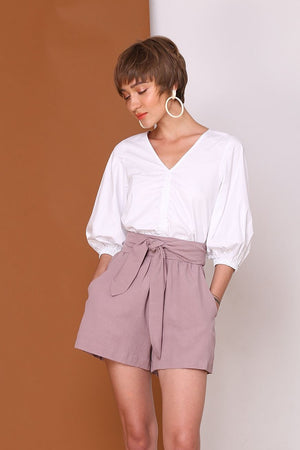 LONG STORY SHORTS | High Waisted Flare Shorts In Pastel Lilac Linen Cotton